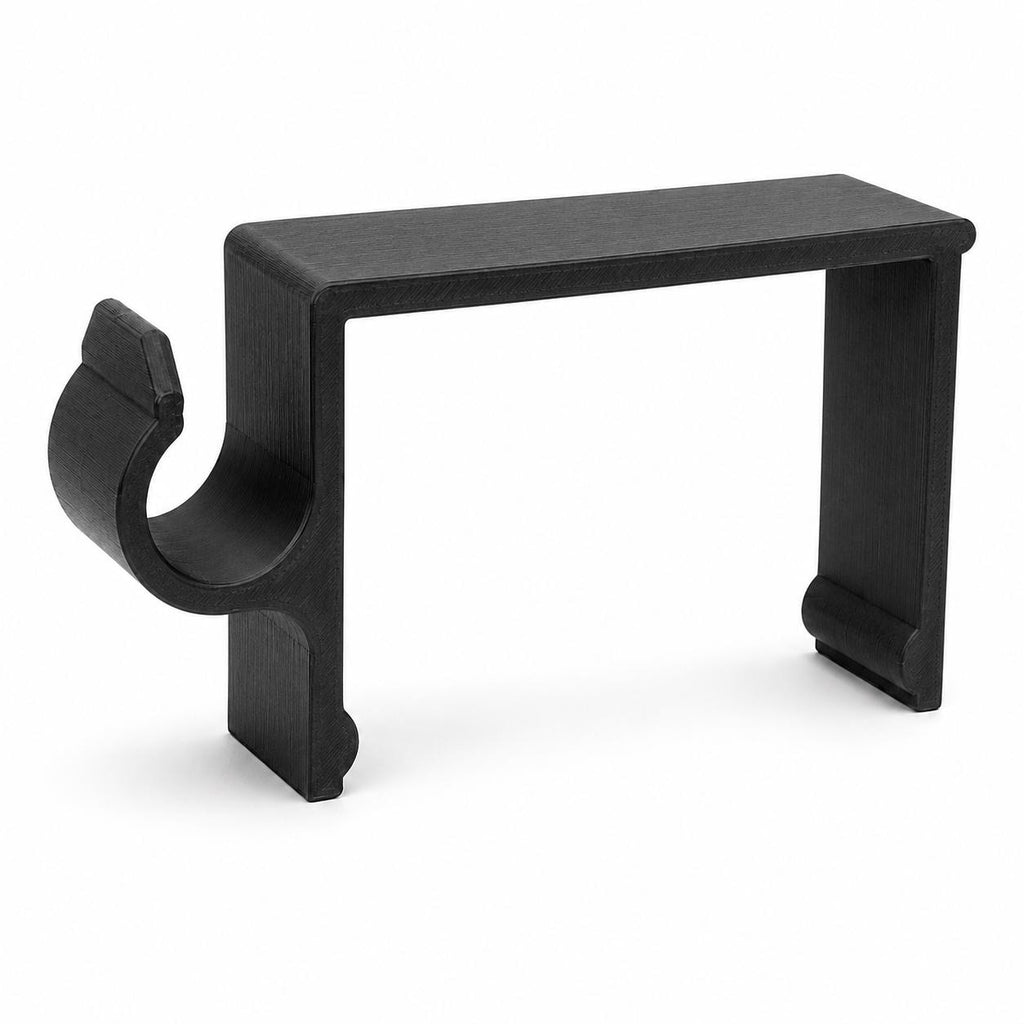 No-drill fence clip with curved snap channel, studio product shot — Groovy Lanterns